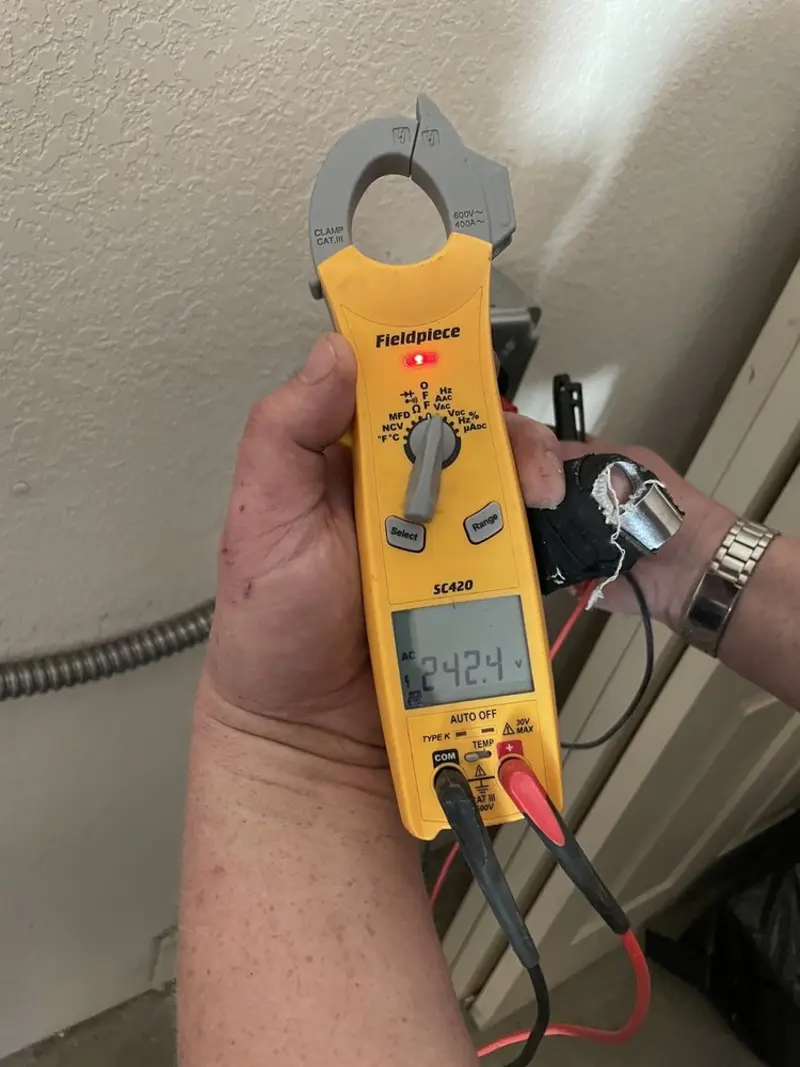 Voltage testing with clamp meter during Generator Installation in Pleasanton